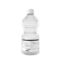 The B. Braun Aqua Ecotainer® Topical Rinse, a transparent plastic bottle with a capacity of 1000 ml, is made from eco-friendly polypropylene. It features a white cap and is labeled with various symbols and texts, including the B. Braun branding and instructions for using the topical rinse.