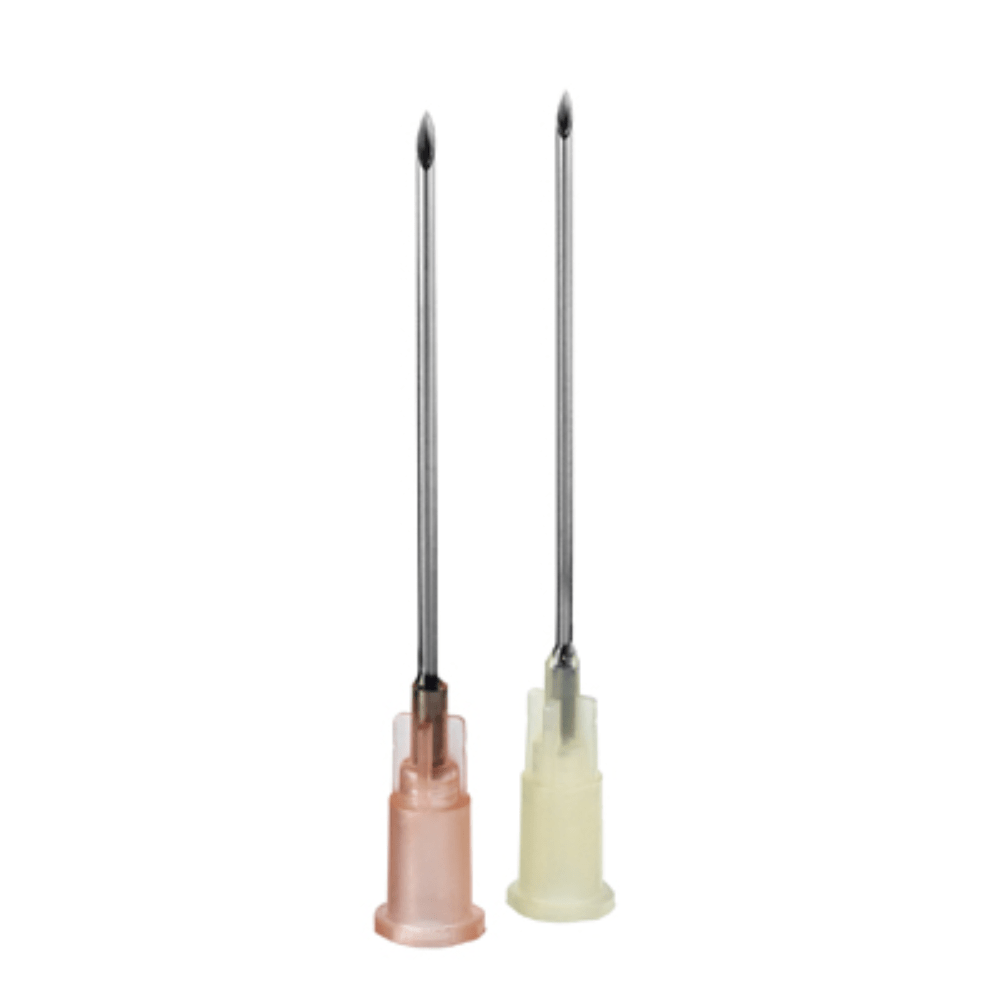 Vertically against a white background, two sharp, thin medical needles with caps are depicted. One needle with a pink cap is the B. Braun Sterican®, used for blood sampling by B. Braun Deutschland GmbH & Co. KG, while the other needle, ideal for low-pain punctures, has a transparent cap.