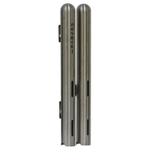 Two Novocal cup dispensers made of stainless steel (double, each Ø 42.4 mm) for about 28 medication cups, with vertical grooves and horizontal slots, connected by clips. The lettering "novocai" is printed vertically on one cup - ideal for an organized dispensing.