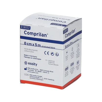 The packaging of the BSN Comprilan® elastic bandage, a compression bandage measuring 8 cm x 5 m and made of 100% cotton, is available in a white box with blue and red accents. It contains manufacturing details and contact information for BSN Medical GmbH in Germany.