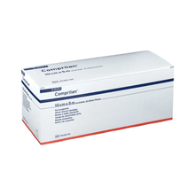A rectangular white-blue box labeled "BSN Comprilan®" from BSN Medical GmbH contains a textile-elastic short-stretch bandage measuring 10 cm x 5 m. Ideal for phlebological indications, the box contains product details and is securely closed.