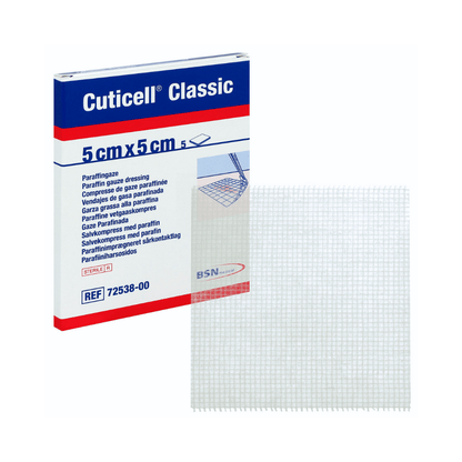 The image shows a rectangular box labeled "BSN Cuticell® Classic sterile ointment dressing with paraffin" from BSN Medical GmbH, with dimensions of 5 cm x 5 cm and a package quantity of 5 pieces. The text contains the term "paraffin gauze" in several languages, indicating that it is impregnated with soft paraffin. In front of the box is a square piece of white gauze, ideal for exudating wounds.