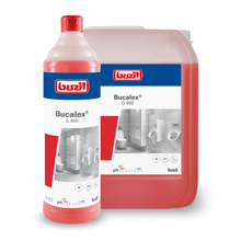 A large bottle and a container of Buzil Bucalex® G 460 Viscous Sanitary Cleaner, a cleaning product from BUZIL-WERK Wagner GmbH & Co. KG. The label emphasizes the phosphoric acid formula and includes an image showing a bathroom with tiles and fixtures. The red liquid inside contains information about the pH value and various product details.