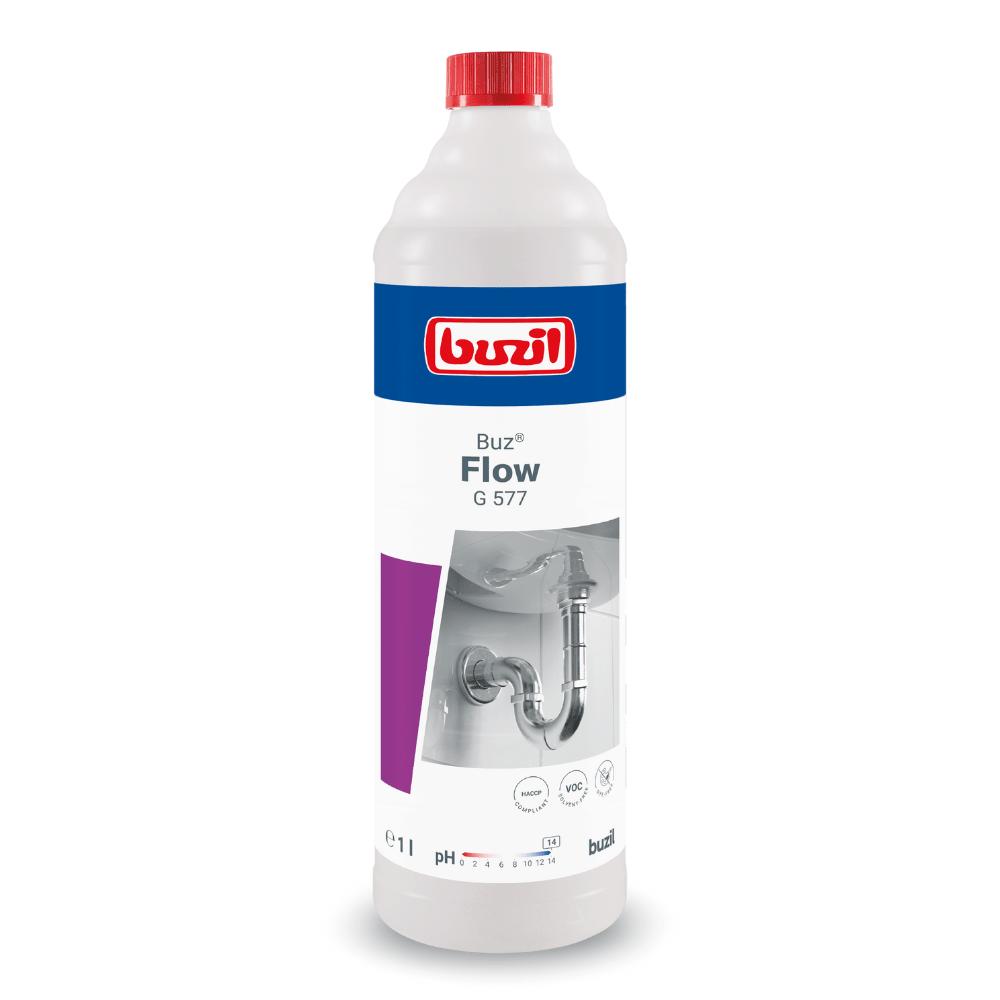 A 1-liter bottle of Buzil Buz® Flow G 577 Liquid Pipe Cleaner, manufactured by BUZIL-WERK Wagner GmbH & Co. KG. The label features a sanitary graphic and the product logo. The predominantly white bottle is accented with red, blue, and violet details and is equipped with a red cap designed to effectively eliminate clogs in drains.