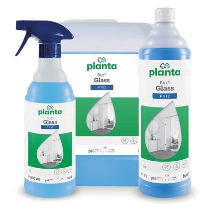Displayed are three containers of Buzil Planta Buz® Glass P 912 Ecological Glass and Surface Cleaner from BUZIL-WERK Wagner GmbH & Co. KG, including a spray bottle, a large container, and a tall bottle. The green-white labels show an image of a room with a large window and emphasize the environmentally friendly properties.