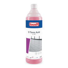 The Buzil O Tens Azid G 501, a 1-liter bottle with pink liquid from BUZIL-WERK Wagner GmbH & Co. KG, is ideal for combating lime stains. The label shows a tiled floor along with symbols highlighting its cleaning properties. This acid-based cleaner is specially designed for effective cleaning and maintenance tasks on porcelain stoneware tiles.