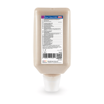 The Buzil Rinax® Clean H 830 hand wash lotion from BUZIL-WERK Wagner GmbH & Co. KG is a rectangular dispenser bottle with hand cleaner for gentle cleaning. It is equipped with a white cap at the bottom and features a label displaying text and a barcode. Upright with the cap down, it stands for professional hygiene.