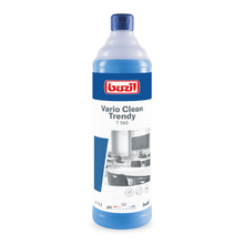 The Buzil Vario Clean Trendy T 560 neutral gentle and plastic cleaner from BUZIL-WERK Wagner GmbH & Co. KG is available in a blue-white bottle featuring a black-and-white image of a pristine classroom with tables and a blackboard. This one-liter cleaner ensures streak-free shine, and the pH indication on the front provides an easy-to-clean effect.