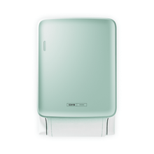 The CWS PureLine Dry | Pack (1 piece) is a sleek, rectangular, mint green paper towel dispenser with a minimalist design, featuring a visible stack of white towels and a small metal label at the bottom edge.