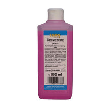 A 500ml plastic bottle of STERN cream soap pink liquid soap from Stern Waschmittel GmbH, with a white flip-top cap. Label with ingredients, instructions for use, contact information, and barcode. Gentle care - suitable for all skin types.