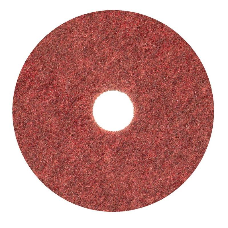 The Diversey Twister Pad TXP scrubbing pad for stone floors from Diversey Deutschland GmbH & Co. OHG is a red, round pad with a central hole and rough structure, ideal for cleaning and maintaining stone floors with advanced Twister technology. Photographed on a white background.