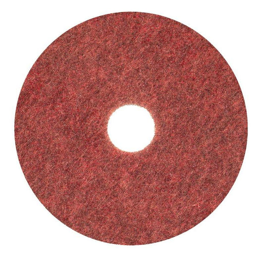 The Diversey Twister Pad TXP scrubbing pad for stone floors from Diversey Deutschland GmbH & Co. OHG is a red, circular pad with a rough texture and central hole, ideal for cleaning and maintaining stone floors, depicted on a white background.