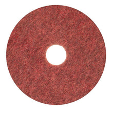 The Diversey Twister Pad TXP scrubbing pad for stone floors from Diversey Deutschland GmbH & Co. OHG is a circular red pad with a rough texture and central hole, designed for cleaning stone floors (from above on a white background).