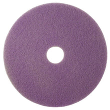 The Twister Pad purple, round from Diversey Deutschland GmbH & Co. OHG was designed for the maintenance cleaning of coated hard floors; it is a round pad with a rough texture and a hole in the middle, depicted from top to bottom on a white background.