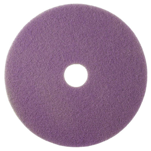 The Twister Pad purple, round from Diversey Deutschland GmbH & Co. OHG was designed for the maintenance cleaning of coated hard floors; it is a round pad with a rough texture and a hole in the middle, depicted from top to bottom on a white background.