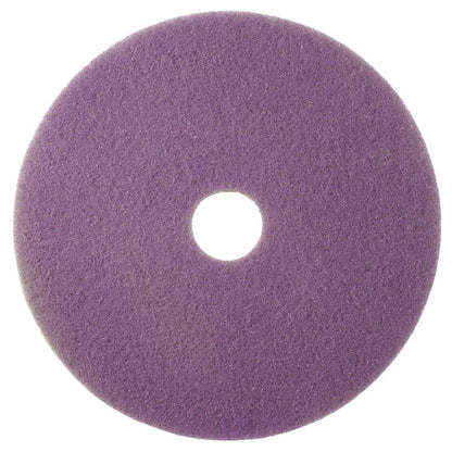 The Twister Pad purple, round by Diversey Deutschland GmbH & Co. OHG, with coarse texture and central hole, is ideal for the maintenance cleaning of coated hard floors and is shown here against a white background.