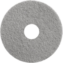 The Diversey Twister Pad Grey from Diversey Deutschland GmbH & Co. OHG is a round, gray polishing pad with a rough surface and central opening - optimal for polishing coated hard floors and for efficient floor care.