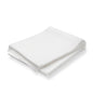 A pack of 100 TASKI dust cloths (60 x 25 cm, oil-soaked) from Diversey Deutschland GmbH & Co. OHG is neatly stacked on a white surface - ideal for daily care and dust removal on coated and uncoated floors.