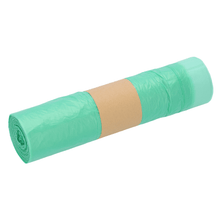 A roll of drawstring bags made of HDPE, 1A material from EMIL DEISS KG (GmbH + Co.), with a brown paper band in the middle, emphasizes their tear resistance. The 60-liter bags are tightly rolled to highlight their secure packaging against a clean white background.