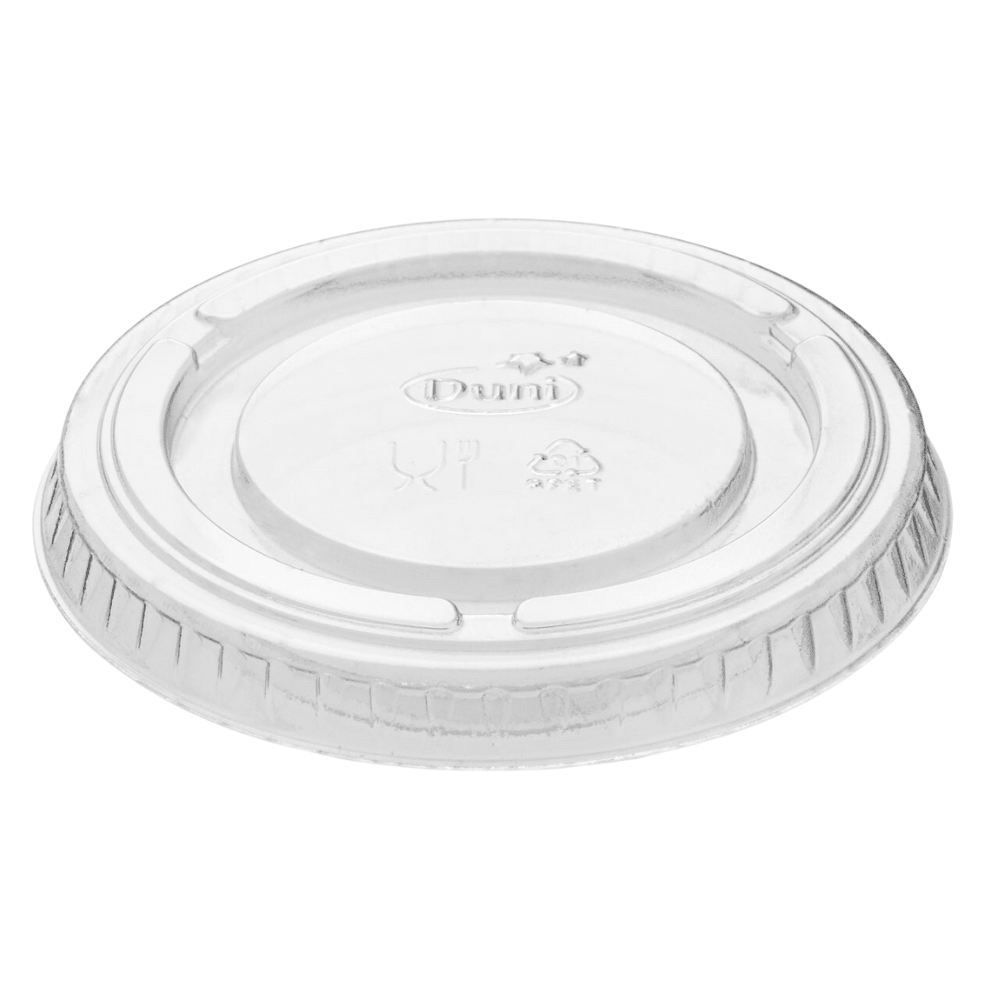 A clear, transparent lid from Duni GmbH features ribbed edges and embossed symbols for recycling and disposal on its surface. It is specifically designed for a 60 ml container, which is often used in the catering industry for storing or taking away food.