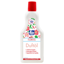 A bottle of "Dr. Becher fragrance oil" with a red cap and a label with floral graphics and text describing the product as exotic and aromatic high-quality perfume oil.