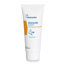 A white tube with the inscription "Dr. Schumacher Descolind Expert Intensive Cream | Tube (100 ml)" from Dr. Schumacher GmbH stands upright against a plain background. The packaging features a yellow rectangle and a drop symbol, emphasizing its hypoallergenic properties, making it perfect for sensitive skin.