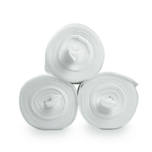 Three large white rolls of fabric, specifically Dr. Schumacher Decso Wipes RT, non-woven cloth rolls, are stacked in a triangular formation against a plain white background. Each roll is tightly wound and reveals its inner hollow core in the middle.