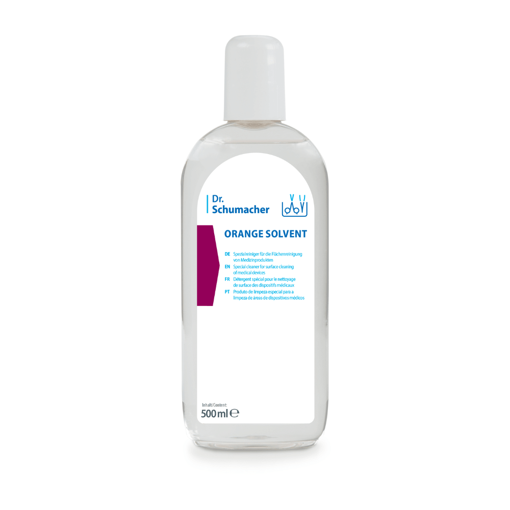A transparent 500-ml bottle of Dr. Schumacher GmbH ORANGE SOLVENT Instrument Cleaner with a white cap and a blue-and-white label, designed for adhesive removal and instrument cleaning, shown against a white background.