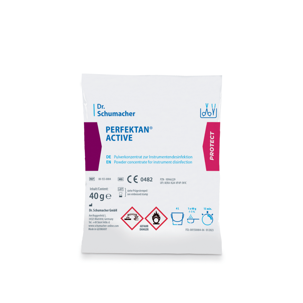 This is an image of a white packet labeled "Dr. Schumacher Perfektan® Active Instrument Disinfection" from Dr. Schumacher GmbH. The packaging indicates that it is a peracetic acid powder concentrate for instrument disinfection. It contains 40 grams and is marked with hazard symbols, application instructions, and inspection marks.