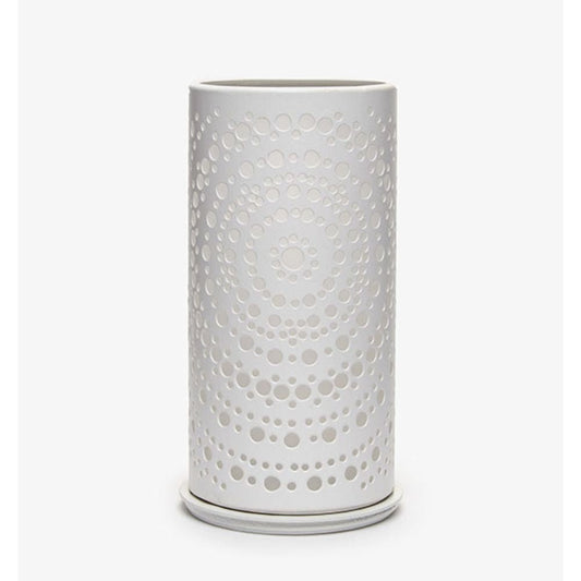 A white cylindrical vase with a modern perforated concentric dot pattern, reminiscent of the elegant Duni candle holder Billy Metal from Duni GmbH, stands against a plain white background.