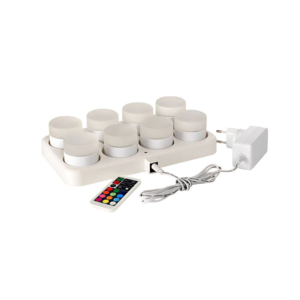 The Duni GmbH Multicolour LED Set, Mini (8-piece) consists of eight mini LED lights for creative lighting, including a remote control and power adapter, all set against a simple white background.