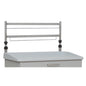 The Novocal Euroschiene 2-fold, a height-adjustable metal frame for rear wall mounting, is mounted above a white cabinet with a handle and raised edge.