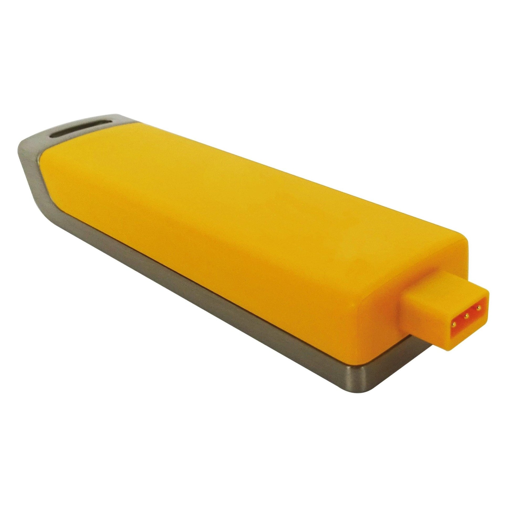 A yellow-silver Novocal programming key for the electronic combination lock (1 piece) with a rectangular housing and three-pin connection lies on a white surface.