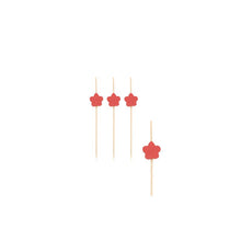 Four eco-friendly bamboo skewers with red flower decoration are evenly arranged on a white background and are ideal as finger food picks from PAPSTAR GmbH for your next party.