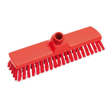 A red rectangular brush head from Haug Bürsten KG (Haug broom, PBT, ø 0.50MM medium, 300x70x40mm) with stiff bristles and a central handle attachment, shown against a white background.