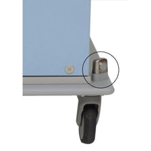 A close-up shows the lower corner of a light blue mobile base with a gray wheel and highlighted Novocal holding magnet on the chassis (1 set = 2 pieces | package), which is known for its strong magnetic force.