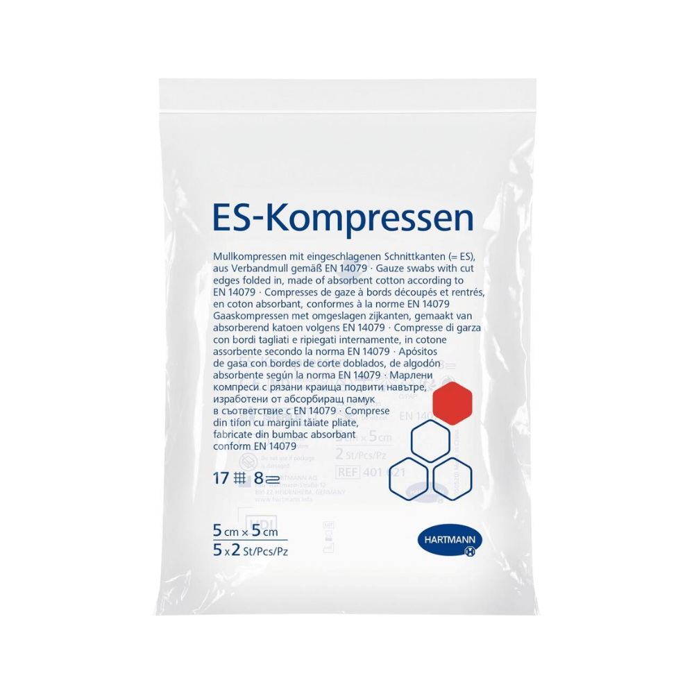 A transparent plastic package labeled “Hartmann ES-Compresses, 8-ply, sterile – 5 x 2 pieces” by Paul Hartmann AG contains gauze compresses for wound care. The label lists features such as non-woven fabric, sterility, and hydrophilic properties, with dimensions of 5 cm x 5 cm. The package contains 5 gauze compresses.