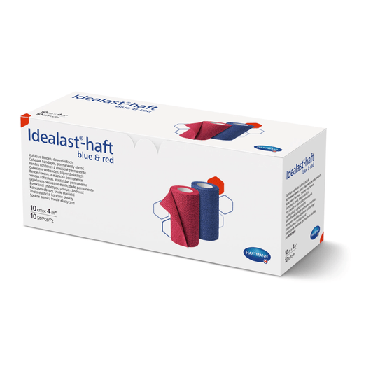 A box of Hartmann Idealast®-haft Color bandages in blue and red, shown from the side, with images and descriptions of the bandages on the packaging. The logo of Paul Hartmann AG is visible.