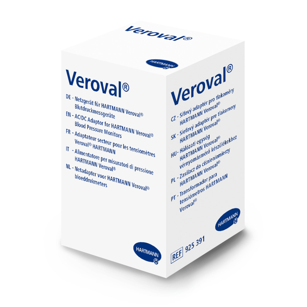 The white "Veroval" box contains a Hartmann Veroval AC/DC Adapter P1 for blood pressure monitors, a multilingual manual, and the Paul Hartmann AG logo to ensure the authenticity of the Veroval upper arm blood pressure monitor.