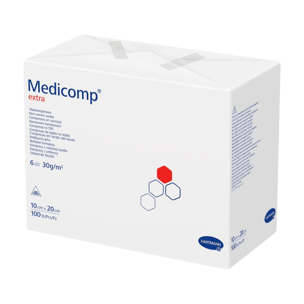 A box of Hartmann Medicomp® extra non-sterile gauze compress - 100 pieces by Paul Hartmann AG, with text and logos predominantly in blue and red on a white background. Sizes and quantities are indicated on the box.