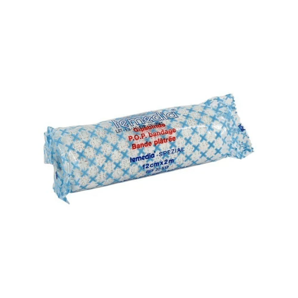 A rolled bandage for immobilization is packed in a blue and white package, bears the inscription "Holthaus Temedia-Special Plaster Bandage - 1 Bandage" and "Bande plâtrée" and measures 12 cm x 2 m. The brand name "Holthaus Medical GmbH & Co. KG" is printed on the packaging, suitable for immobilization in the event of fractures.