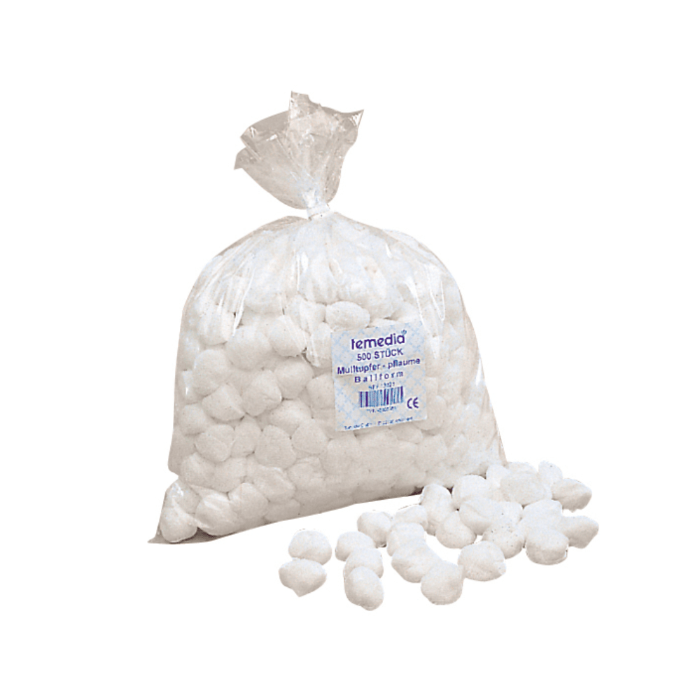 In a transparent plastic bag labeled “Holthaus Medical GmbH & Co. KG” are several loop gauze swabs Temedia non-sterile size 2, in spherical shape and walnut color (500 pieces). Some of the cotton balls are poured out of the bag, which is closed with a cable tie and placed on a white surface. These medical swabs are excellent for wound care.
