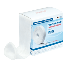 A white box of Holthaus Ypselast® tubular bandage in various sizes from Holthaus Medical GmbH & Co. KG. The box contains blue and red text as well as an image of the partially unrolled bandage. The bandage is 8 cm wide and 20 m long, and the packaging states that it is made in Germany.