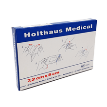 A blue-white box "Holthaus Ypsiderm® plus wound dressing 7.2 x 5 cm - 5 plasters" from Holthaus Medical GmbH & Co. KG contains five plasters. On the box, there is a pictorial step-by-step guide for applying the self-adhesive wound dressing, as well as information about the manufacturer and the reference number 1250.