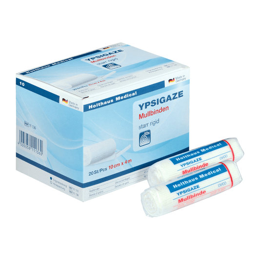 Beside two individual rolls, a box of Holthaus Ypsigaze gauze bandage from Holthaus Medical GmbH & Co. KG is displayed. The hard bandage is 10 cm x 4 m in size and contains 20 pieces.