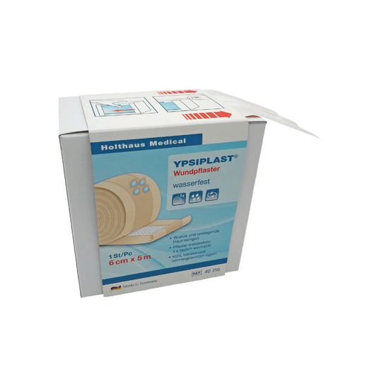A box of Holthaus Ypsiplast adhesive bandages, water-repellent by Holthaus Medical GmbH & Co. KG. The predominantly white box with blue text offers a view of the bandage inside. Ideal for small wounds, it describes the waterproof adhesive bandage with the dimensions 6 cm x 5 m. The packaging also notes that it is made in Germany.