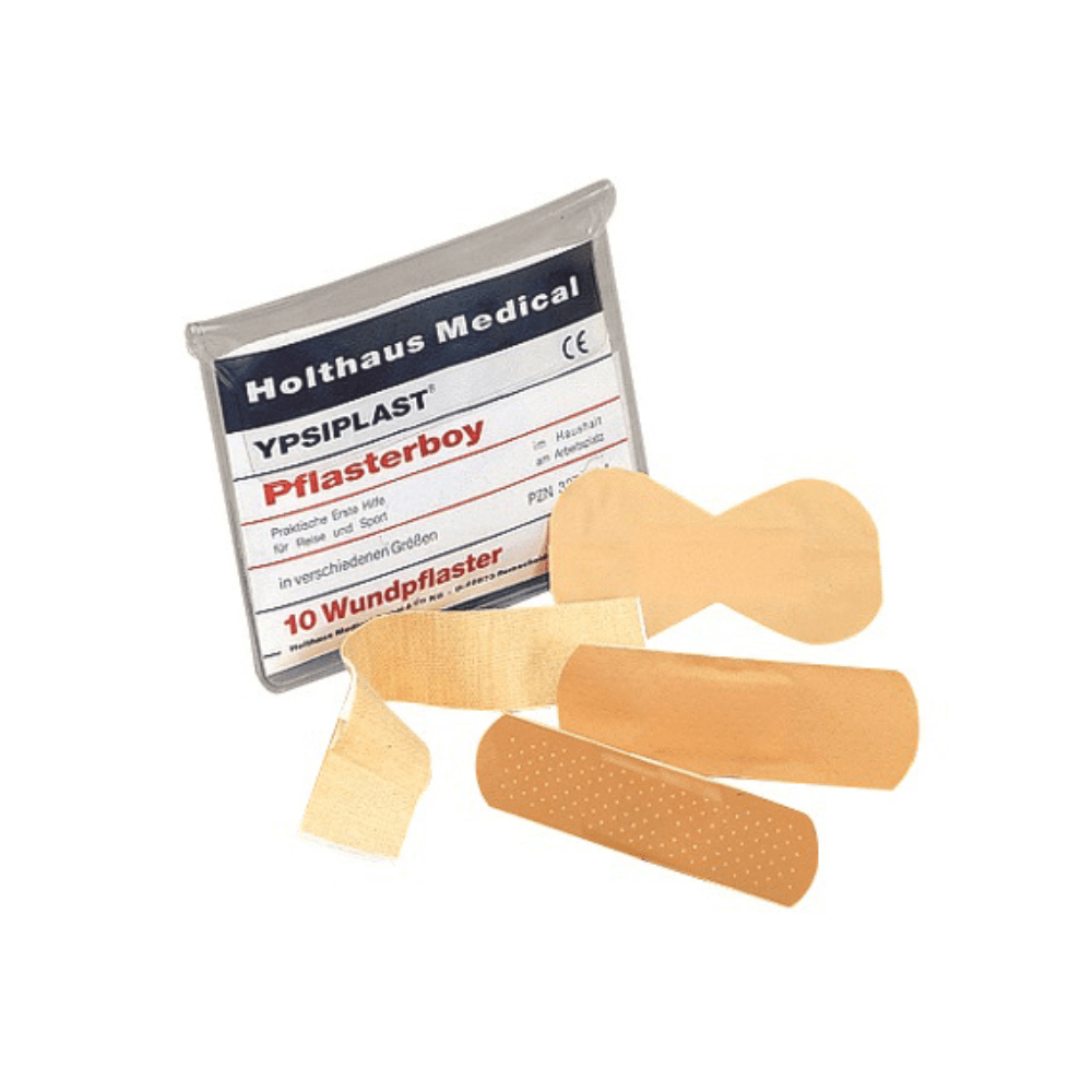 Pictured is a package of "Holthaus Ypsiplast® Pflasterboy". The 10-piece plaster set from Holthaus Medical GmbH & Co. KG contains 10 different plasters of various shapes and sizes, including a butterfly bandage, a gauze strip, and two rectangular plasters.