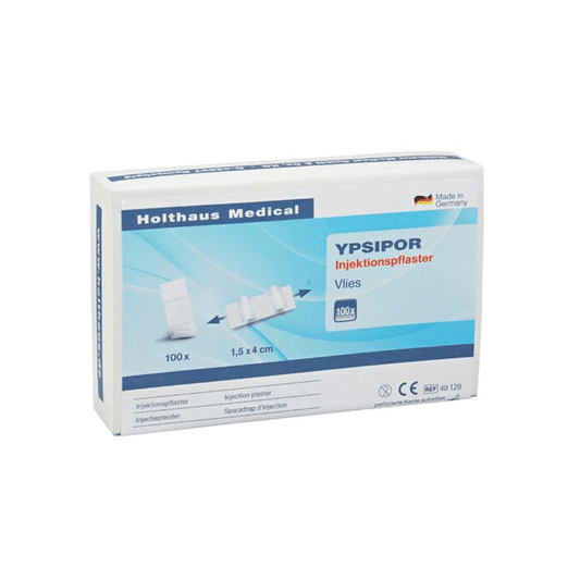 Displayed is a box of Holthaus Ypsipor Injection Plasters from Holthaus Medical GmbH & Co. KG. The predominantly white packaging with blue accents contains 100 plasters measuring 1.5x4 cm. The box contains German text and an image of the plasters.