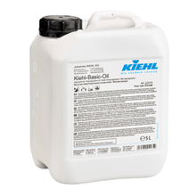 A white 5-liter plastic container with a black lid and the label "Kiehl Kiehl-Basic-Oil Impregnating Oil" from Johannes Kiehl KG features multilingual brand information and care instructions for wood surfaces on the front.