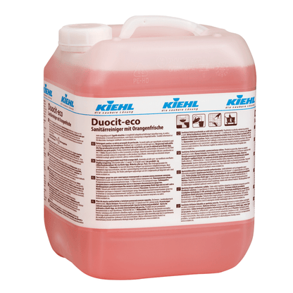 A large, transparent plastic container with pink liquid is labeled "Kiehl Duocit-eco sanitary cleaner with orange freshness" by Johannes Kiehl KG and on the front, product information and eco-friendly cleaning tips in German.